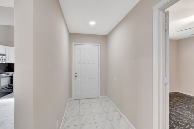 82 Baytree Cir, Boynton Beach, FL 33436 - hallway with baseboards, light marble finish flooring, and recessed lighting