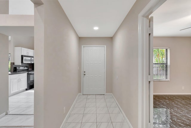 82 Baytree Cir, Boynton Beach, FL 33436 - hallway with light marble finish flooring, baseboards, and recessed lighting
