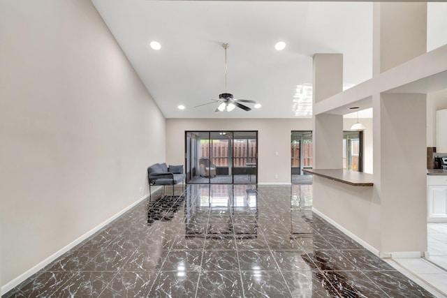 82 Baytree Cir, Boynton Beach, FL 33436 - living area featuring marble finish flooring, ceiling fan, baseboards, and recessed lighting