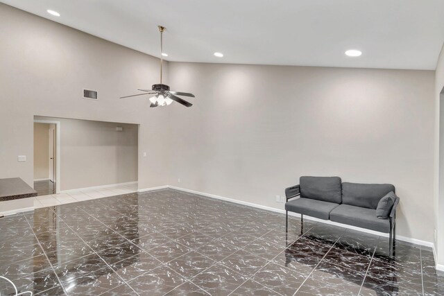 82 Baytree Cir, Boynton Beach, FL 33436 - living area with recessed lighting, a ceiling fan, baseboards, a towering ceiling, and marble finish floors