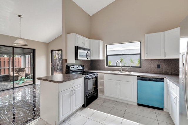 82 Baytree Cir, Boynton Beach, FL 33436 - kitchen with dishwashing machine, stainless steel microwave, electric range, a sink, and high vaulted ceiling