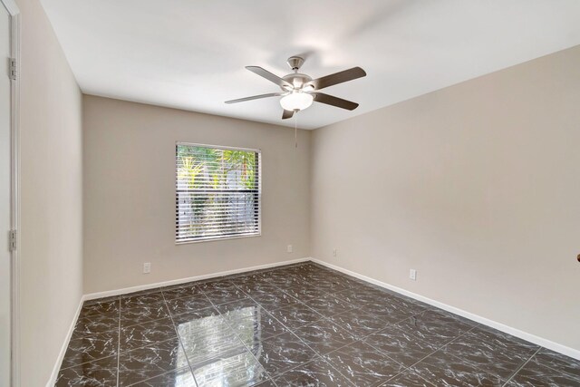 82 Baytree Cir, Boynton Beach, FL 33436 - spare room with ceiling fan and baseboards