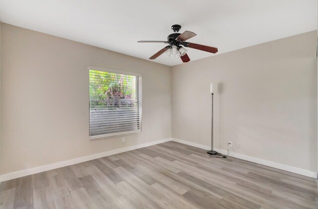 82 Baytree Cir, Boynton Beach, FL 33436 - spare room with light wood finished floors, baseboards, and ceiling fan