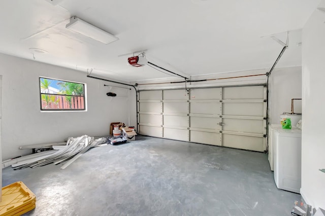 82 Baytree Cir, Boynton Beach, FL 33436 - garage with washer / dryer and a garage door opener