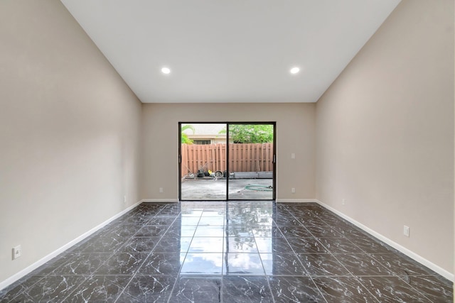 82 Baytree Cir, Boynton Beach, FL 33436 - empty room featuring baseboards, recessed lighting, and marble finish flooring
