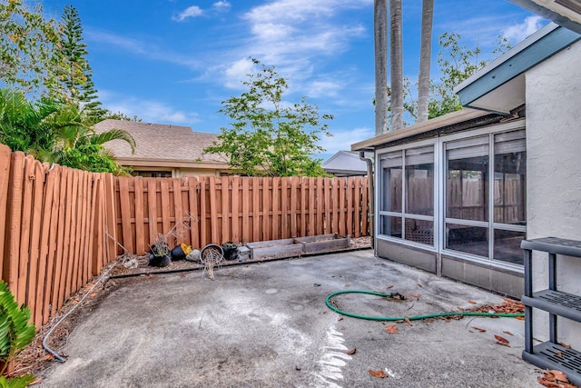 82 Baytree Cir, Boynton Beach, FL 33436 - fenced backyard featuring a patio and a sunroom