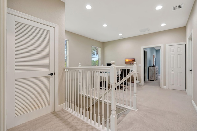 5030 Dulce Ct, Palm Beach Gardens, FL 33418 - corridor with an upstairs landing, carpet, recessed lighting, and baseboards