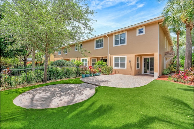 5030 Dulce Ct, Palm Beach Gardens, FL 33418 - back of house featuring a patio area and stucco siding