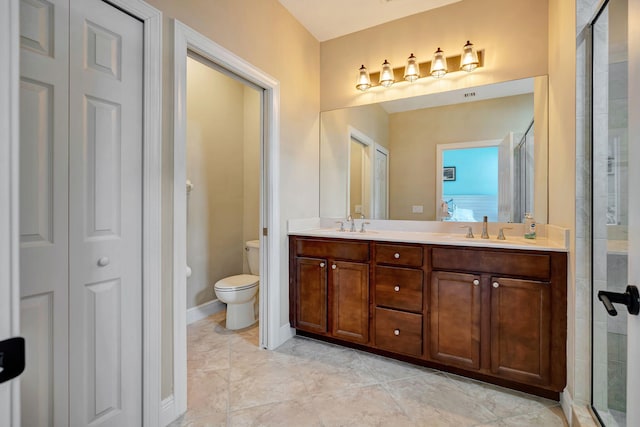 5030 Dulce Ct, Palm Beach Gardens, FL 33418 - full bath with toilet, double vanity, a shower stall, and a closet