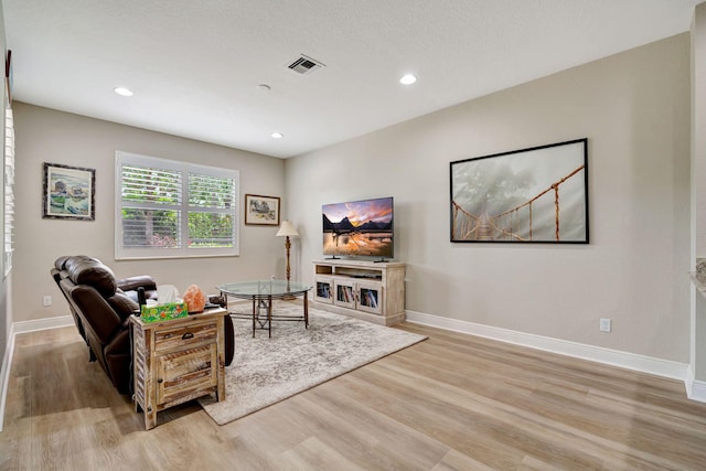 5030 Dulce Ct, Palm Beach Gardens, FL 33418 - living area featuring light wood-type flooring, baseboards, and recessed lighting