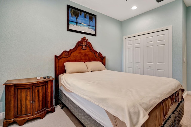 5030 Dulce Ct, Palm Beach Gardens, FL 33418 - carpeted bedroom with a closet, baseboards, and recessed lighting
