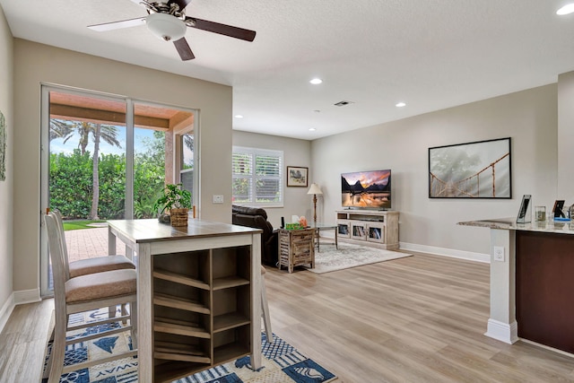 5030 Dulce Ct, Palm Beach Gardens, FL 33418 - dining space featuring baseboards, light wood finished floors, a ceiling fan, and recessed lighting