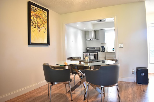 2597 Emory Dr W Unit G, West Palm Beach, FL 33415 - dining area featuring wood finished floors and baseboards