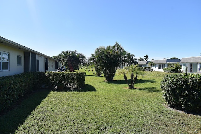 2597 Emory Dr W Unit G, West Palm Beach, FL 33415 - view of grassy yard
