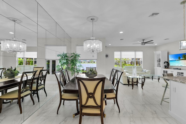 11454 SW Hawkins Ter, Port Saint Lucie, FL 34987 - dining room with a chandelier, light marble finish floors, a ceiling fan, and recessed lighting