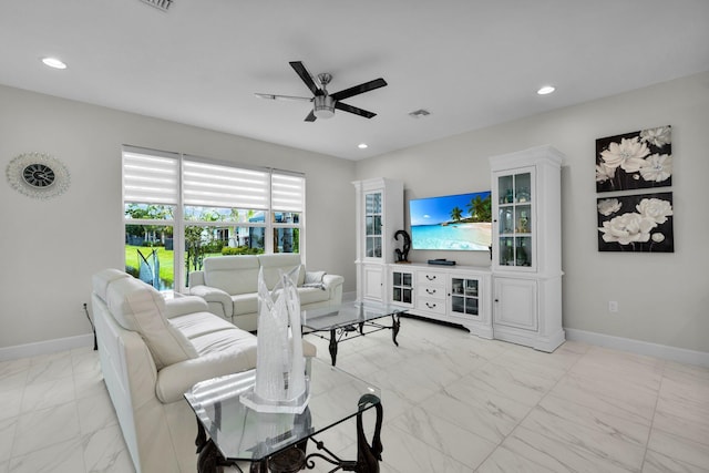 11454 SW Hawkins Ter, Port Saint Lucie, FL 34987 - living area with light marble finish floors, a ceiling fan, and recessed lighting
