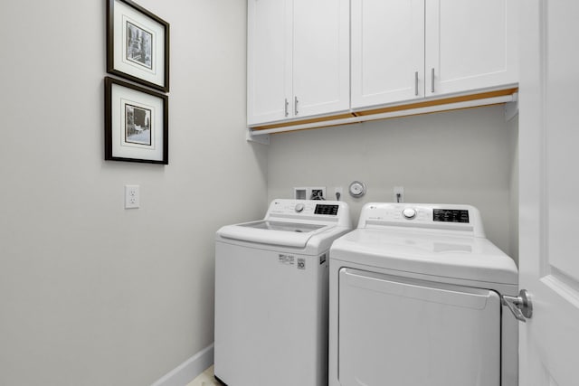 11454 SW Hawkins Ter, Port Saint Lucie, FL 34987 - washroom with washer and clothes dryer and cabinet space