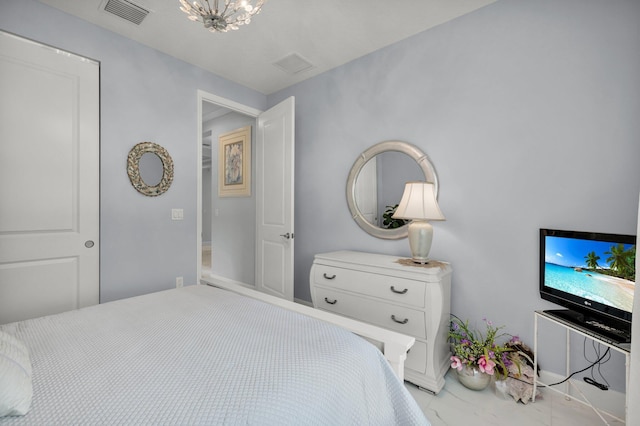 11454 SW Hawkins Ter, Port Saint Lucie, FL 34987 - bedroom featuring light marble finish flooring and a chandelier
