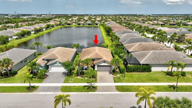 11454 SW Hawkins Ter, Port Saint Lucie, FL 34987 - aerial perspective of suburban area with a nearby body of water