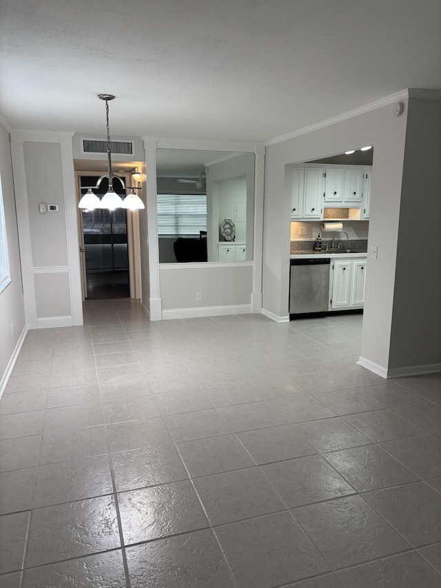 489 Flanders K, Delray Beach, FL 33484 - unfurnished living room featuring a chandelier, dark tile patterned floors, baseboards, and a sink