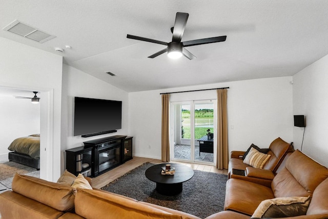 956 Bent Creek Dr, Fort Pierce, FL 34947 - living room featuring ceiling fan and vaulted ceiling