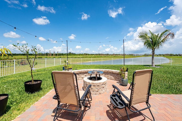 956 Bent Creek Dr, Fort Pierce, FL 34947 - view of patio featuring a fire pit and a water view