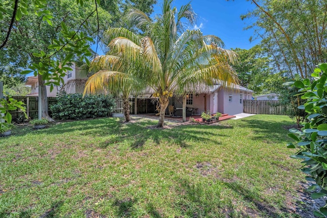 1005 SW 15th Ter, Fort Lauderdale, FL 33312 - view of yard featuring a patio