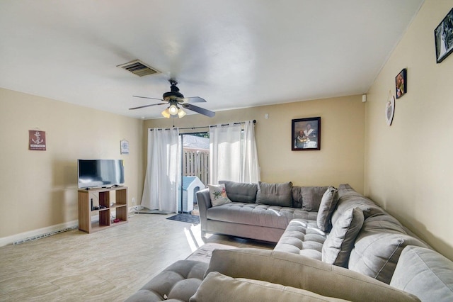 799 Hill Dr Unit F, West Palm Beach, FL 33415 - living room featuring a ceiling fan and baseboards