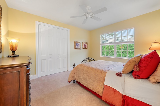 18974 SE Jupiter River Dr, Jupiter, FL 33458 - bedroom featuring light carpet, a closet, a ceiling fan, and baseboards
