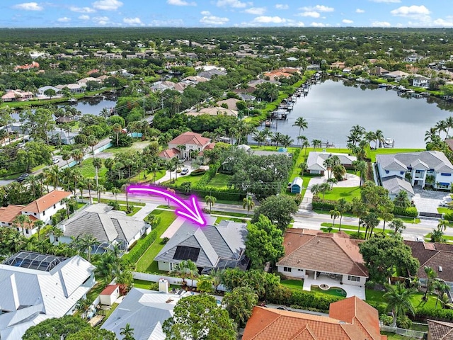 18974 SE Jupiter River Dr, Jupiter, FL 33458 - aerial perspective of suburban area with a large body of water