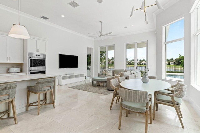206 Via Emilia, Palm Beach Gardens, FL 33418 - dining space featuring ornamental molding, a ceiling fan, and recessed lighting