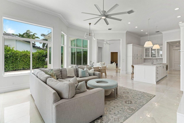 206 Via Emilia, Palm Beach Gardens, FL 33418 - living area with ceiling fan, ornamental molding, recessed lighting, and baseboards