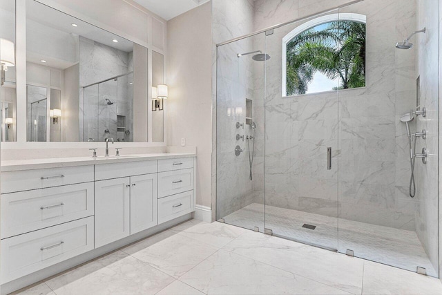 206 Via Emilia, Palm Beach Gardens, FL 33418 - full bath with a marble finish shower, vanity, marble finish flooring, recessed lighting, and baseboards