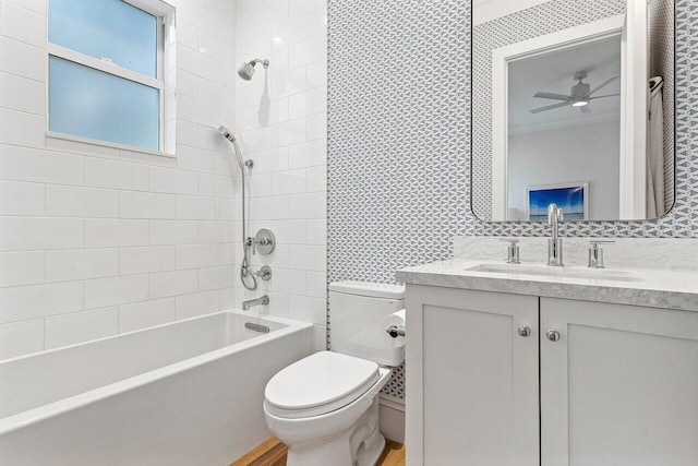 206 Via Emilia, Palm Beach Gardens, FL 33418 - bathroom with toilet,  shower combination, vanity, and a ceiling fan