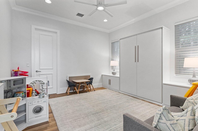 206 Via Emilia, Palm Beach Gardens, FL 33418 - living area with ornamental molding, wood finished floors, recessed lighting, and a ceiling fan