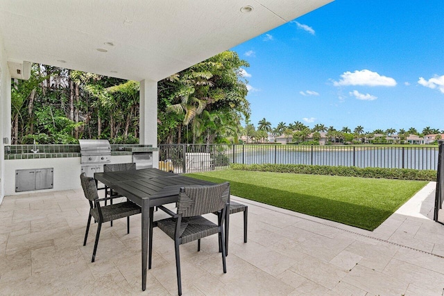 206 Via Emilia, Palm Beach Gardens, FL 33418 - view of patio with outdoor dining area and a water view