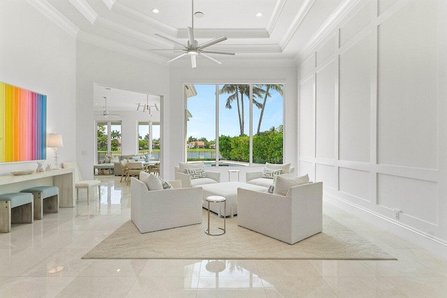 206 Via Emilia, Palm Beach Gardens, FL 33418 - living area featuring ceiling fan, ornamental molding, a towering ceiling, marble tiled flooring, and recessed lighting