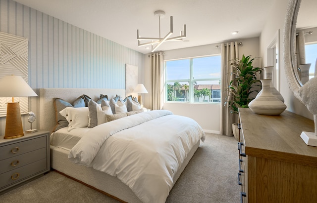 7472 Lenora Ln, Lake Worth, FL 33467 - bedroom featuring light colored carpet, baseboards, a chandelier, and wallpapered walls