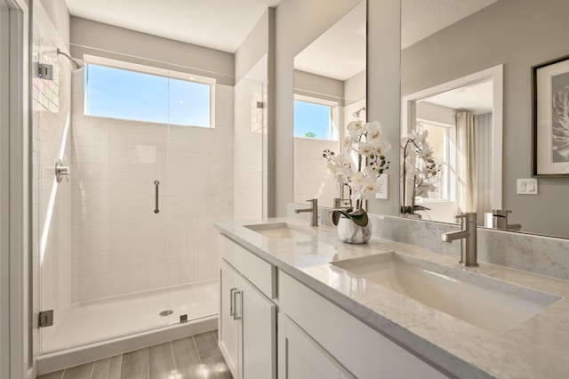 7472 Lenora Ln, Lake Worth, FL 33467 - full bath featuring double vanity, a shower stall, and wood finished floors