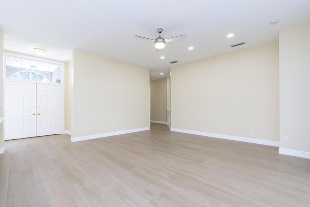 2925 SW Brighton Way, Palm City, FL 34990 - spare room featuring ceiling fan, light wood-style floors, and recessed lighting