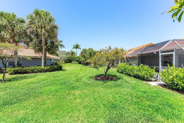 7572 Island Breeze Ter, Boynton Beach, FL 33437 - view of grassy yard with a lanai