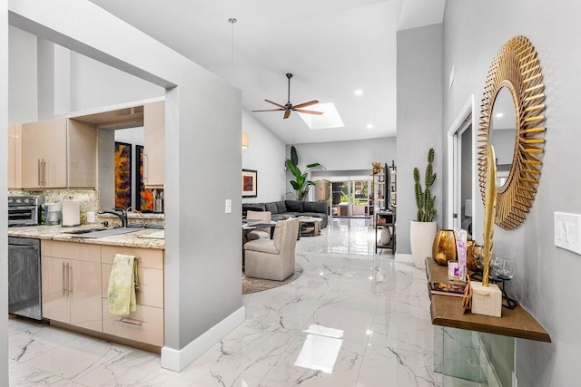 7572 Island Breeze Ter, Boynton Beach, FL 33437 - corridor featuring light marble finish floors, a sink, baseboards, a skylight, and recessed lighting
