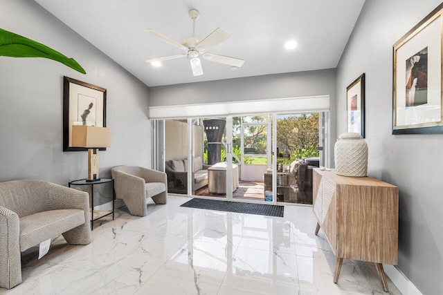 7572 Island Breeze Ter, Boynton Beach, FL 33437 - sitting room with marble tiled flooring, ceiling fan, and baseboards