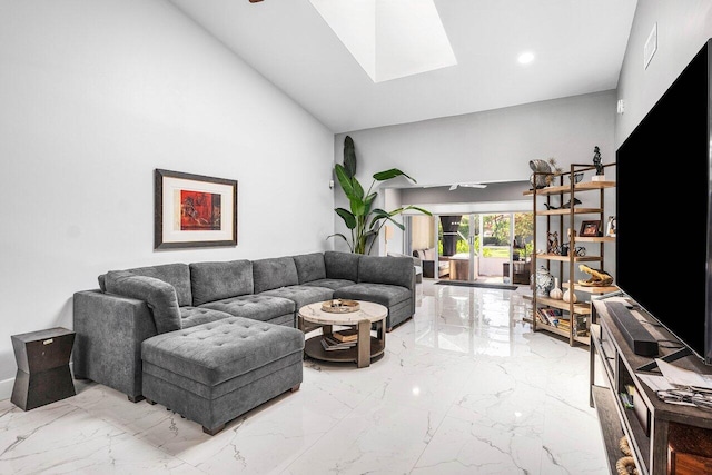 7572 Island Breeze Ter, Boynton Beach, FL 33437 - living area with marble tiled flooring, a skylight, and high vaulted ceiling