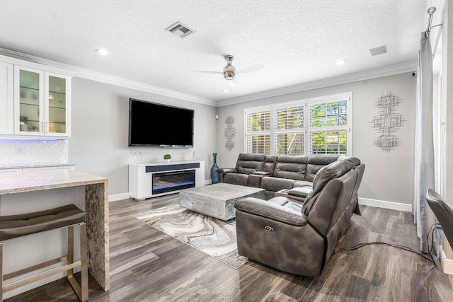 9961 Marsala Way, Delray Beach, FL 33446 - living area with ceiling fan, baseboards, wood finished floors, crown molding, and a textured ceiling