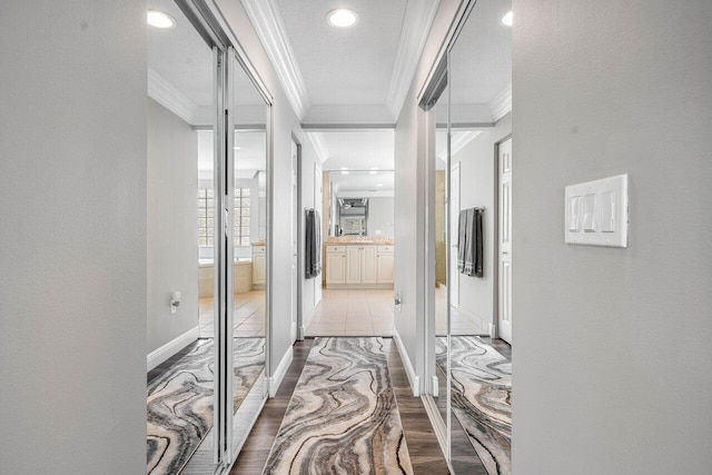 9961 Marsala Way, Delray Beach, FL 33446 - hall with ornamental molding, recessed lighting, baseboards, and light wood-style flooring