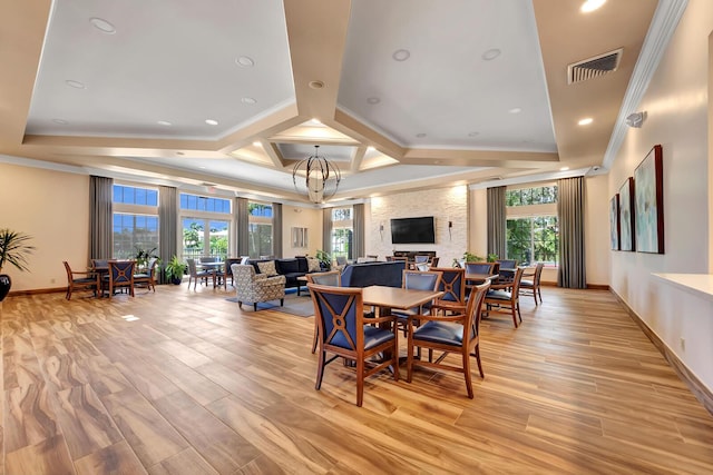 9961 Marsala Way, Delray Beach, FL 33446 - dining room featuring ornamental molding, baseboards, a large fireplace, coffered ceiling, and light wood-style floors