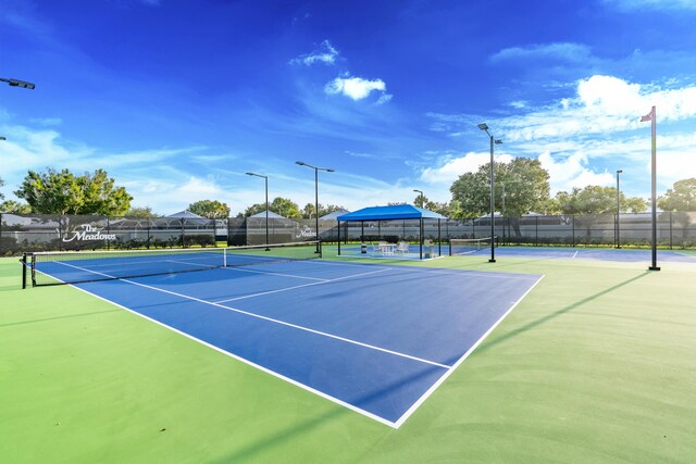2608 SW Greenwich Way, Palm City, FL 34990 - view of tennis court with community basketball court