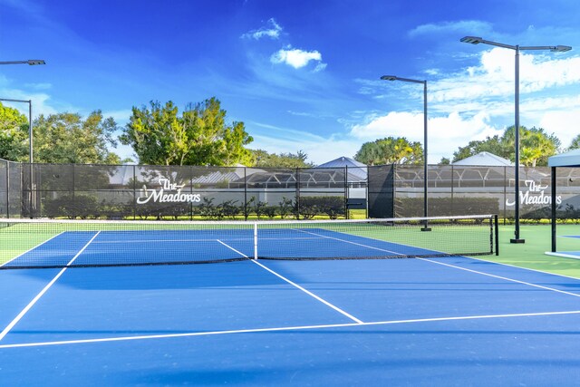 2608 SW Greenwich Way, Palm City, FL 34990 - view of tennis court featuring community basketball court