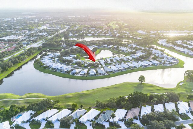 2608 SW Greenwich Way, Palm City, FL 34990 - aerial view of property and surrounding area with nearby suburban area and a nearby body of water